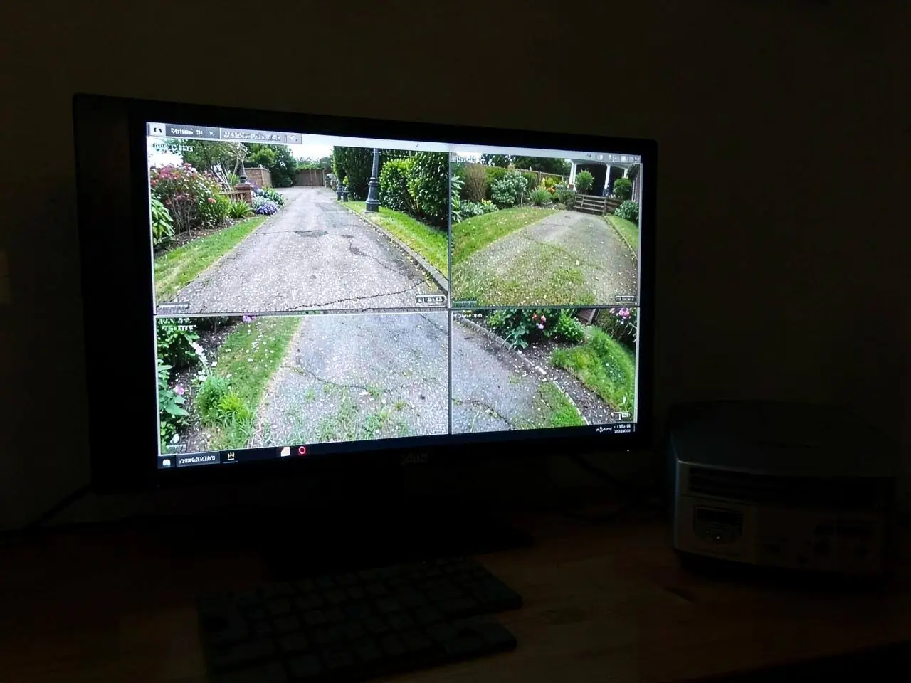 CCTV monitoring screens showing camera views of a Berkshire property